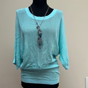 Express size small. Lightweight cute too.